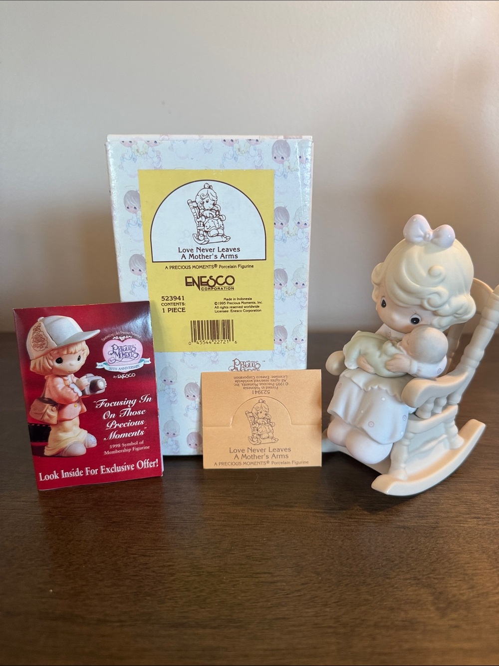 Precious Moments “Love Never Leaves A Mother’s Arms” Figurine